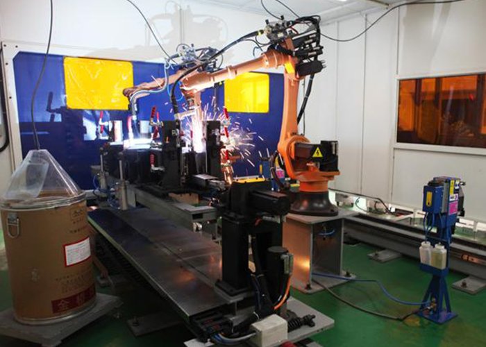 Elevator beam raising robot workstation