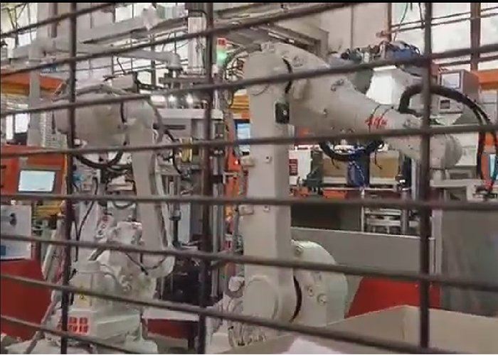 Automotive shock absorber robot workstation