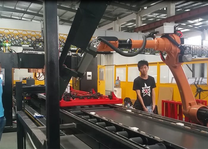 Elevator door panel robot workstation